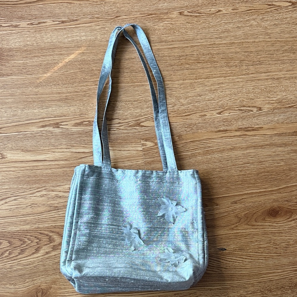 Elegant Silver Tote with Floral Design